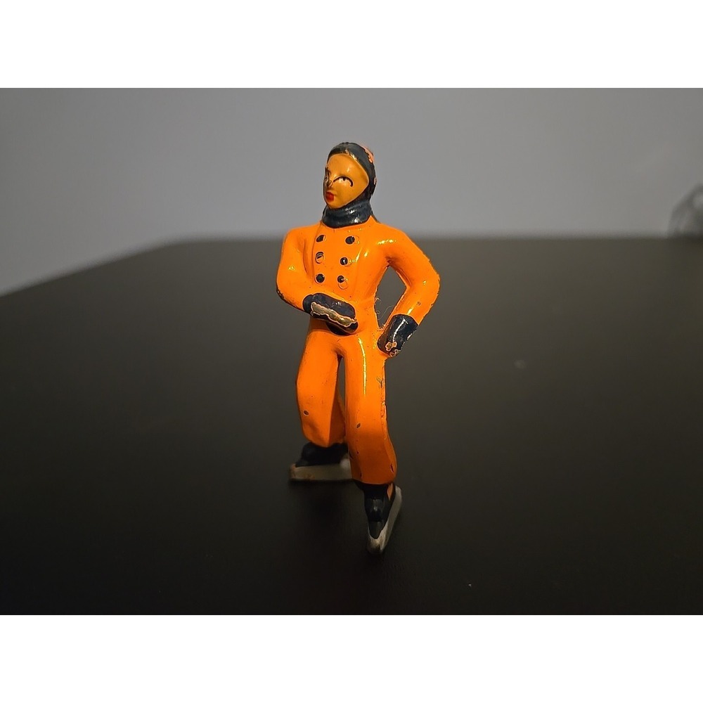 Vintage BARCLAY MANOIL LEAD FIGURE ICE SKATER MAN ORANGE SUIT VINTAGE 40's